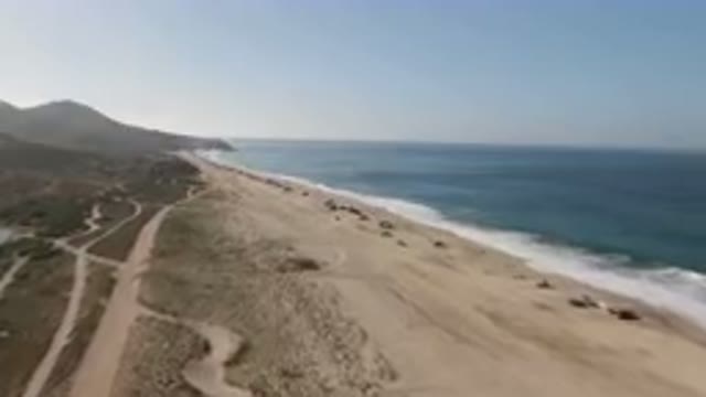 MIGRINO BCS MEXICO-2023: Aerial View of Sandy Beach and Ocean Shoreline