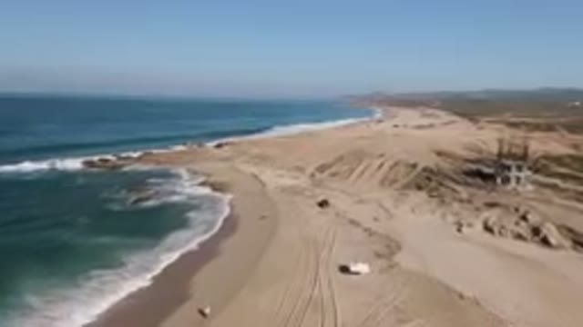 MIGRINO BCS MEXICO-2023: Truck That Is Parked On The Beach Near The Water