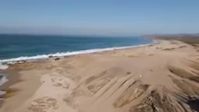 MIGRINO BCS MEXICO-2023: Truck Parked On Beach By The Water
