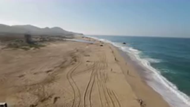 MIGRINO BCS MEXICO-2023: On The Beach With A Truck And A Truck In The Water