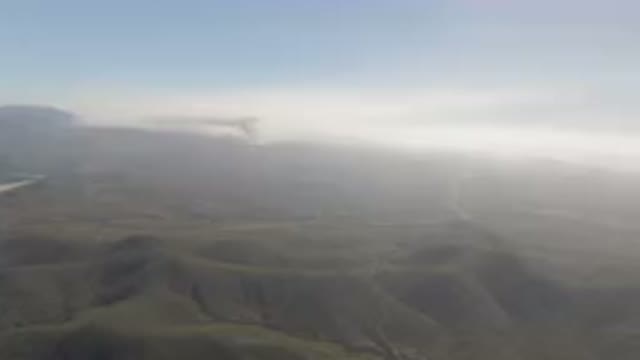 MIGRINO BCS MEXICO-2023: Mountain With A Road Going Through It