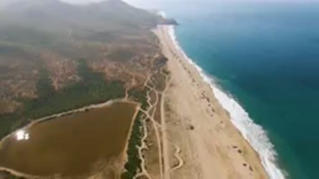MIGRINO BCS MEXICO-2023: Aerial Beach And A Body Of Water