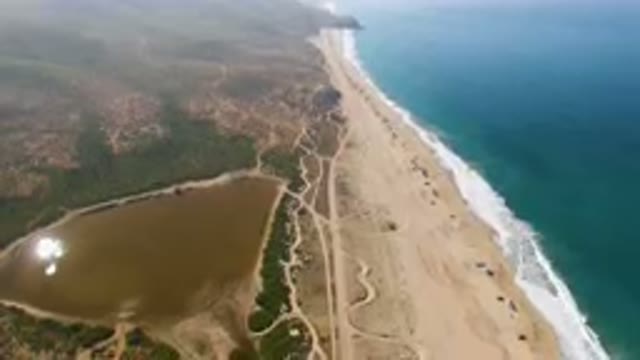 MIGRINO BCS MEXICO-2023: Aerial Beach With A Body Of Water And A Sandy Beach