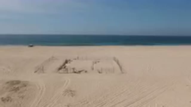 MIGRINO BCS MEXICO-2023: Beach With A Fence And A Beach Chair