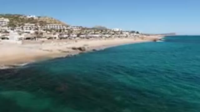 LAGUNA BEACH LOS CABOS BCS MEXICO-2023: Beach With A Lot Of Houses And A Body Of Water