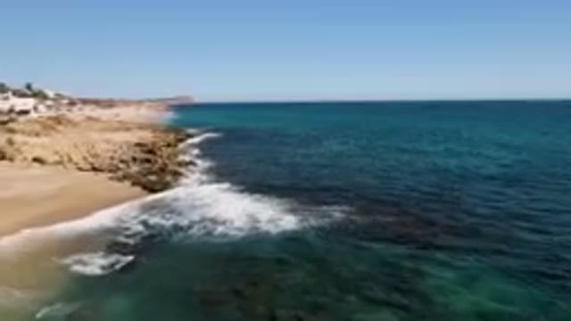 LAGUNA BEACH LOS CABOS BCS MEXICO-2023: Beach With A Cliff And A Body Of Water