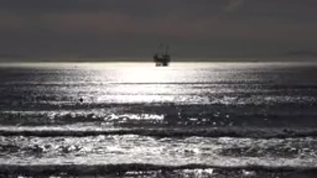 MALIBU CALIFORNIA-2020: A Beach At Sunset With Clouds Overcast