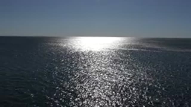 MALIBU CALIFORNIA-2020: Birds Eye View Of Deep Blue Ocean At Sunset