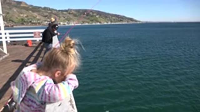 MALIBU CALIFORNIA-2020: Little Girl Wants To Fish
