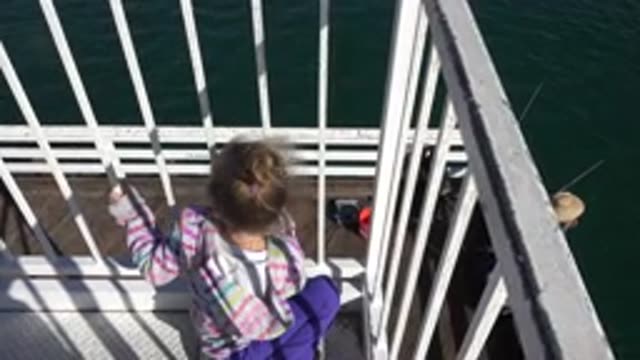 MALIBU CALIFORNIA-2020: Girl Observing The Ocean And Feeling The Breeze From The Balcony