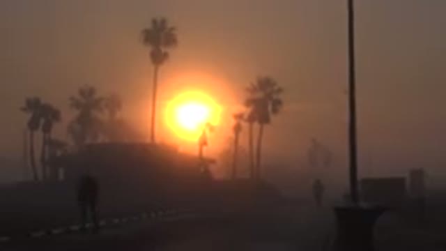 HUNTINGTON BEACH CALIFORNIA-2020: Filming The Sunset From A California Beach