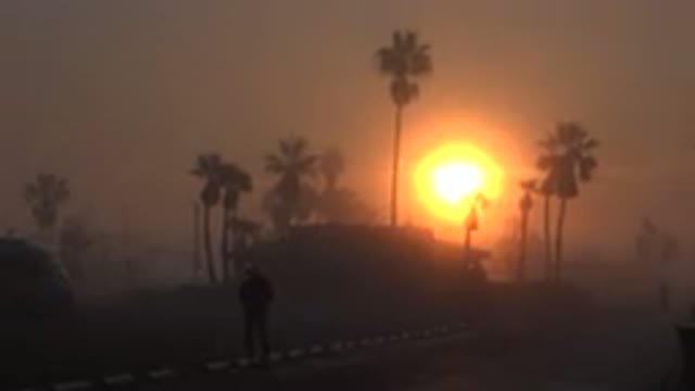 HUNTINGTON BEACH CALIFORNIA-2020: Man Walking On An Empty Road On A Golden