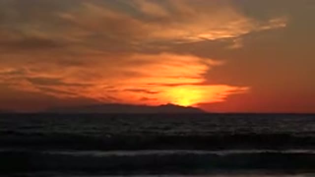 HUNTINGTON BEACH CALIFORNIA-2020: Wonderful Sunset On The Beach With Waves