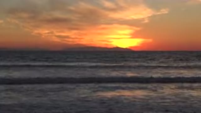 HUNTINGTON BEACH CALIFORNIA-2020: A Beautiful Picture Of A Sunset Over The Ocean