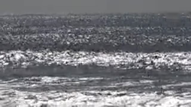 HUNTINGTON BEACH CALIFORNIA-2020: Waves In A Large Body Of Water With One Person