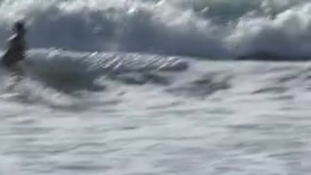 HUNTINGTON BEACH CALIFORNIA-2020: Looping Video Of Surfer Practicing Surf