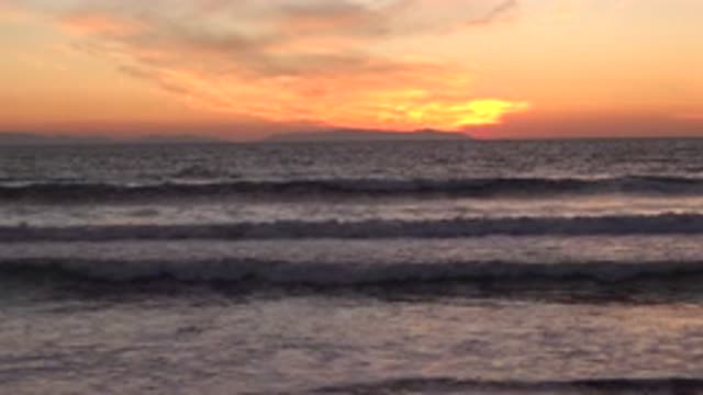 HUNTINGTON BEACH CALIFORNIA-2020: Waves Flow Slowly And Calmly In The Foreground