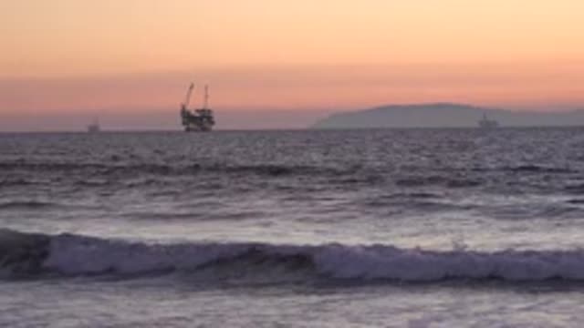 HUNTINGTON BEACH CALIFORNIA-2020: A Ship Going Out To Sea On A Beautiful Sunny Morning