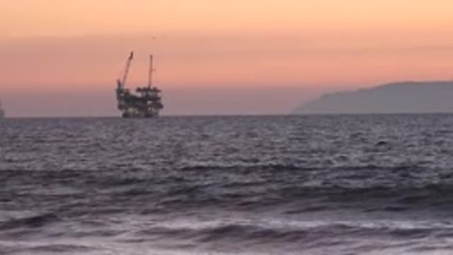 HUNTINGTON BEACH CALIFORNIA-2020: Industrial Station Looming On The Fogged Horizon