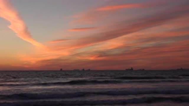 HUNTINGTON BEACH CALIFORNIA-2020: Listening To The Sounds Of The Ocean As The