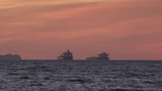 HUNTINGTON BEACH CALIFORNIA-2020: Two Cargo Ships Leave The Port For Their Journey