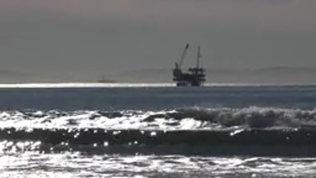HUNTINGTON BEACH CALIFORNIA-2020: Machine Inside The Ocean With Strong Wind And Waves