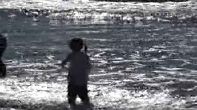 HUNTINGTON BEACH CALIFORNIA-2020: Small Girl Enjoying Waves at the Beach