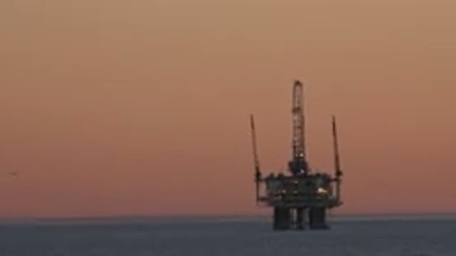 HUNTINGTON BEACH CALIFORNIA-2020: Foreign Object Floating In The Middle Of The Ocean