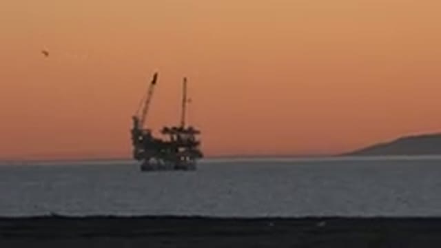 HUNTINGTON BEACH CALIFORNIA-2020: Petroleum Platform In The Sea In Afternoon