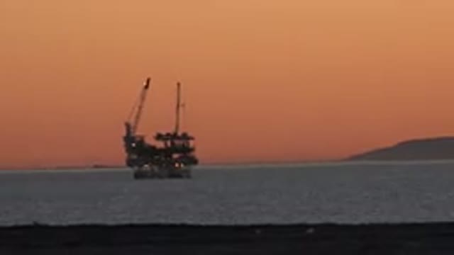 HUNTINGTON BEACH CALIFORNIA-2020: Pretty Orange Sky Platform With Construction