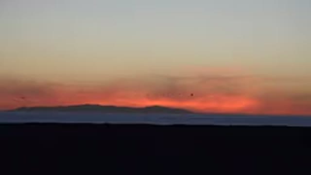 HUNTINGTON BEACH CALIFORNIA-2020: The Horizon in the Dusk at the Distance Beyond