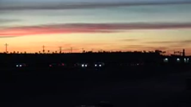 HUNTINGTON BEACH CALIFORNIA-2020: View Of Gold Sunset And Light Traffic On A