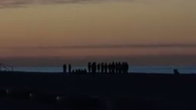 HUNTINGTON BEACH CALIFORNIA-2020: Group Of People Hanging Together On The Beach