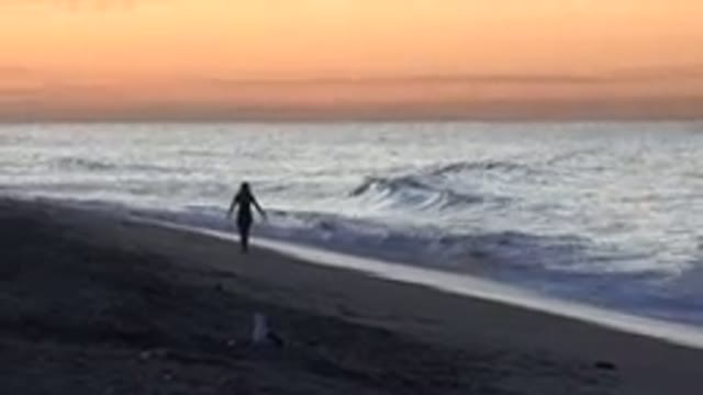 HUNTINGTON BEACH CALIFORNIA-2020: Walking Alone At This Beautiful Beach With