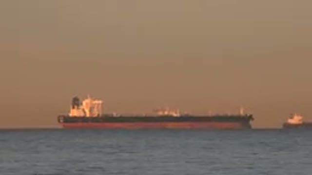 HUNTINGTON BEACH CALIFORNIA-2020: Large Pescador Boat Floating in the Distance