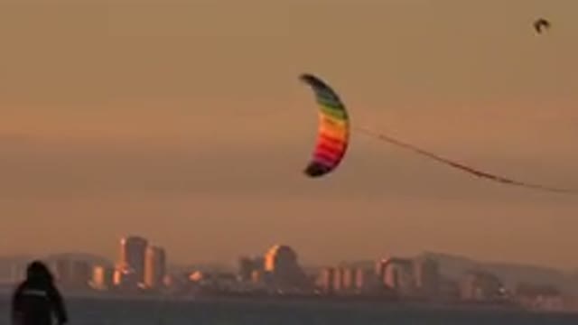 HUNTINGTON BEACH CALIFORNIA-2020: Video Of The Multicoloured Kite Going Up On