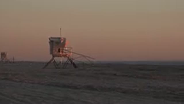 HUNTINGTON BEACH CALIFORNIA-2020: Sunset On The Beach With Your Boyfriend And A Drink