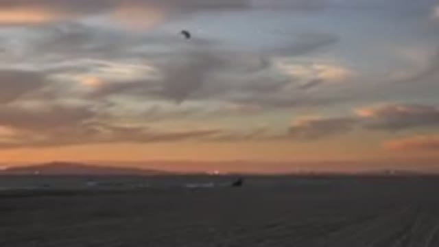 HUNTINGTON BEACH CALIFORNIA-2020: Evening Sky Kite Flying In A Circular Pattern