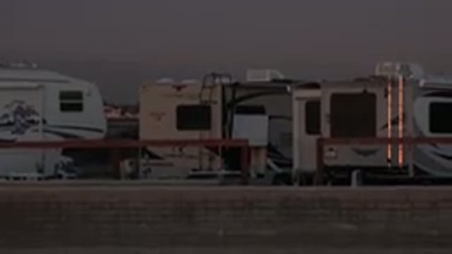 HUNTINGTON BEACH CALIFORNIA-2020: Three Camping Vans Parked On The Side Of The Highway
