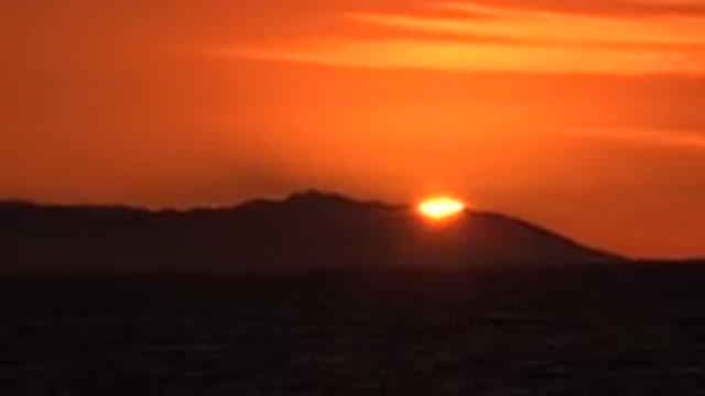 HUNTINGTON BEACH CALIFORNIA-2020: Amazing Sunset Behind The Mountains With The