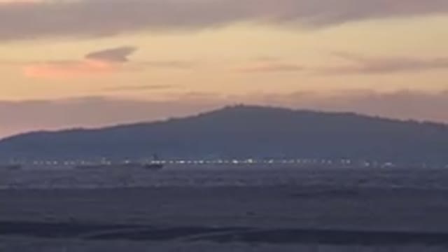 HUNTINGTON BEACH CALIFORNIA-2020: A Record With A Beautiful Landscape Of A Kite At Sunset
