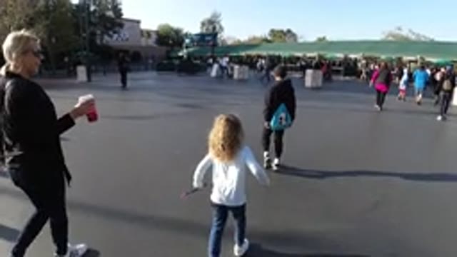 DISNEYLAND CALIFORNIA-2020: Families Walk Towards The Opening Gate Of