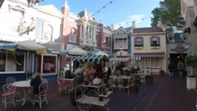 DISNEYLAND CALIFORNIA-2020: View Of Two People Leaving Outdoor Food Court On A