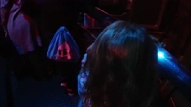 DISNEYLAND CALIFORNIA-2020: A Man And His Daughter Waiting In Line For Their Turn