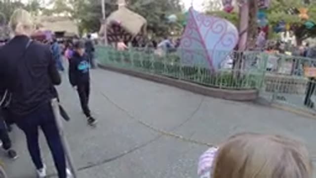 DISNEYLAND CALIFORNIA-2020: Little Girl Walking Into An Area And A Little Boy