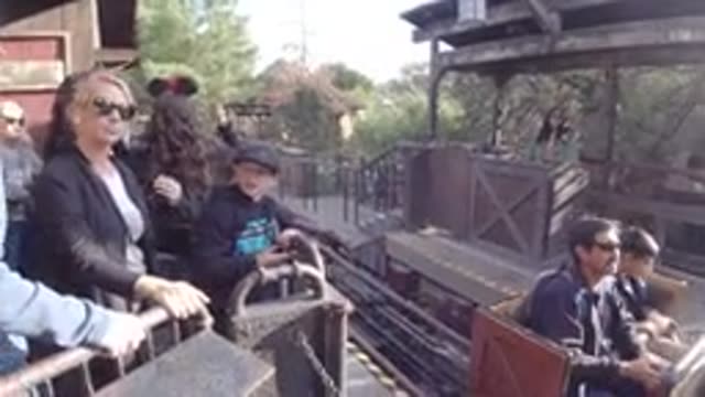 DISNEYLAND CALIFORNIA-2020: People Riding In Roller Coaster Cars As Train Leaves