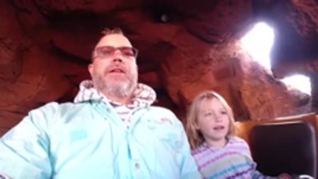 DISNEYLAND CALIFORNIA-2020: Father And Daughter On A Log Flume Roller Coaster