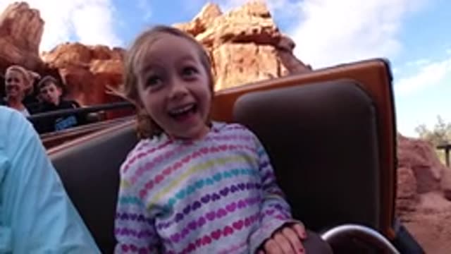 DISNEYLAND CALIFORNIA-2020: Kid Excited Riding Roller Coaster at Amusement Park