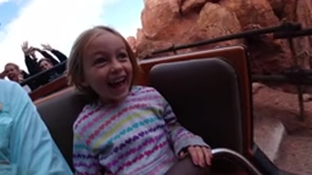 DISNEYLAND CALIFORNIA-2020: A Young White Girl Enjoying A Ride On A Roller Coaster