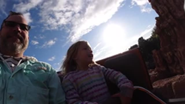 DISNEYLAND CALIFORNIA-2020: A Slow Motion Recording Of A Dad With His Daughter
